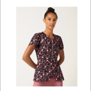 Jaanuu Peplum Scrub Top